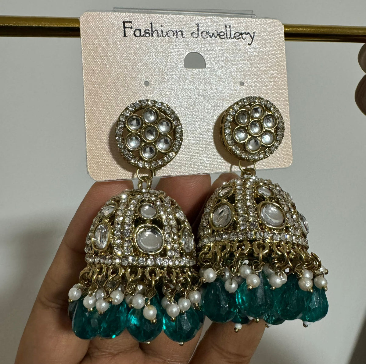 Gold-Plated Dome Shaped Kundan Studded Jhumkas