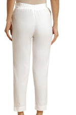 Ecru Solid Cotton Flax Slim Pants in Germany