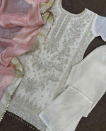 Pure Jimmy Choo Silk Suit in Germany