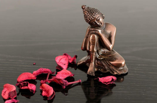 Resting Buddha on Knee Metal in Germany