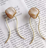 Golden Hanging Sophisticated Resin Stone Drop Brass Earrings in Germany Namma Markt