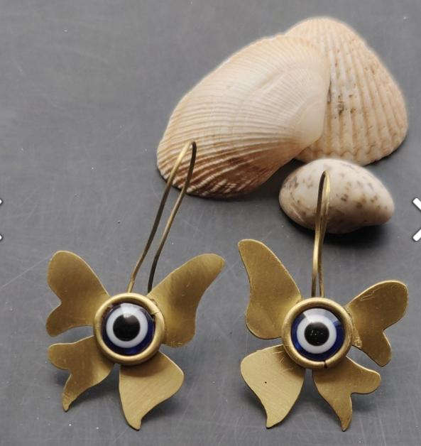 Evil eye stone with butterfly shaped brass earrings in Germany Namma Markt