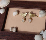 Bird shape earrings in Germany