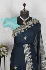 Beautiful organza saree with stitched blouse in Munich