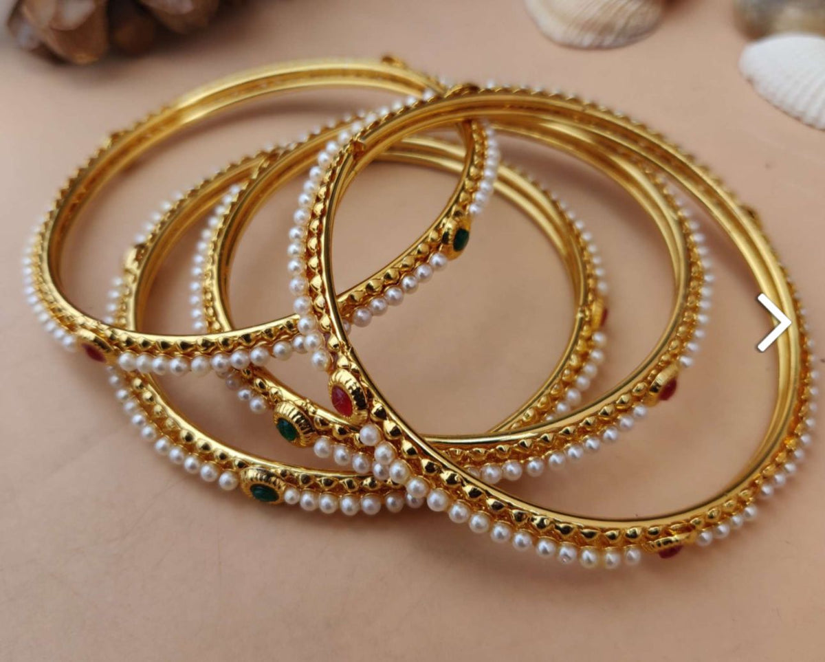 Mad Club elegant pearls studded gold plated 4 pcs bangles set in Munich