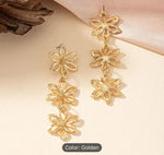 Golden Hollow Flower Design Long Dangle Earrings in Berlin