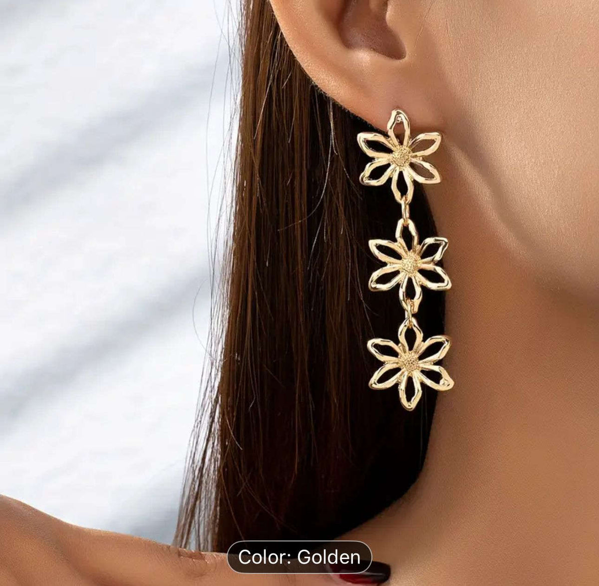 Golden Hollow Flower Design Long Dangle Earrings in Berlin Namma Markt
