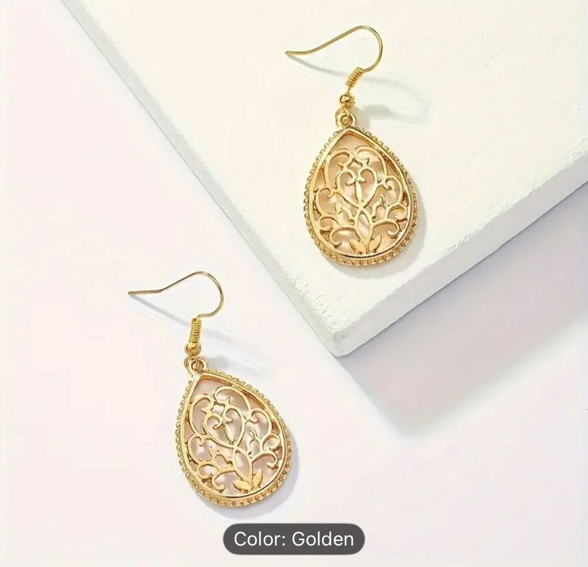 Hollow Golden Flower Pattern Teardrop Dangle Earrings in Germany