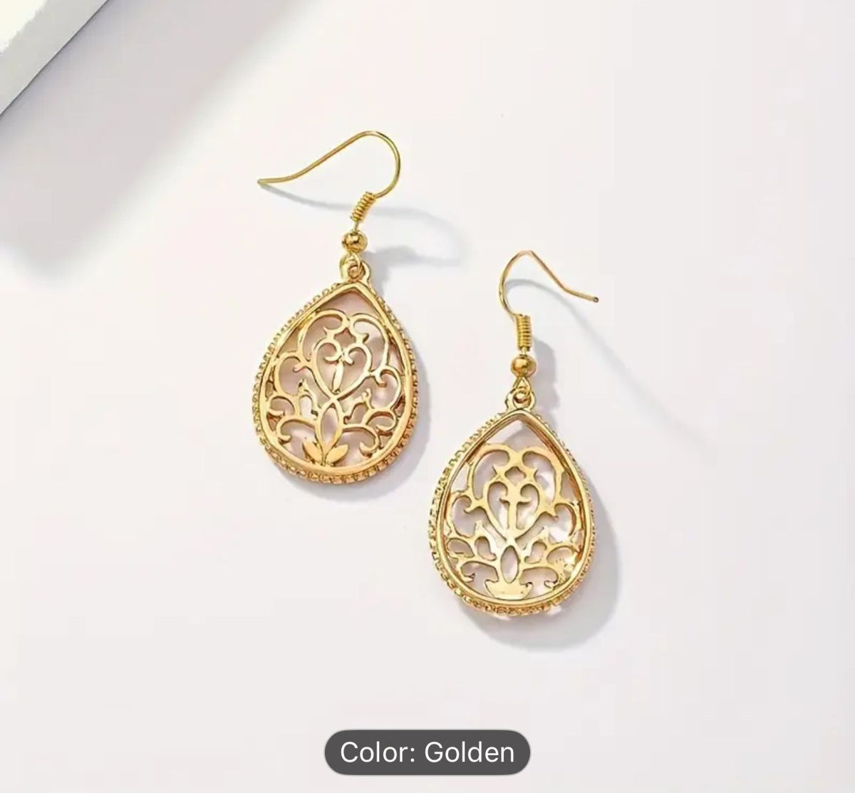 Hollow Golden Flower Pattern Teardrop Dangle Earrings in Germany