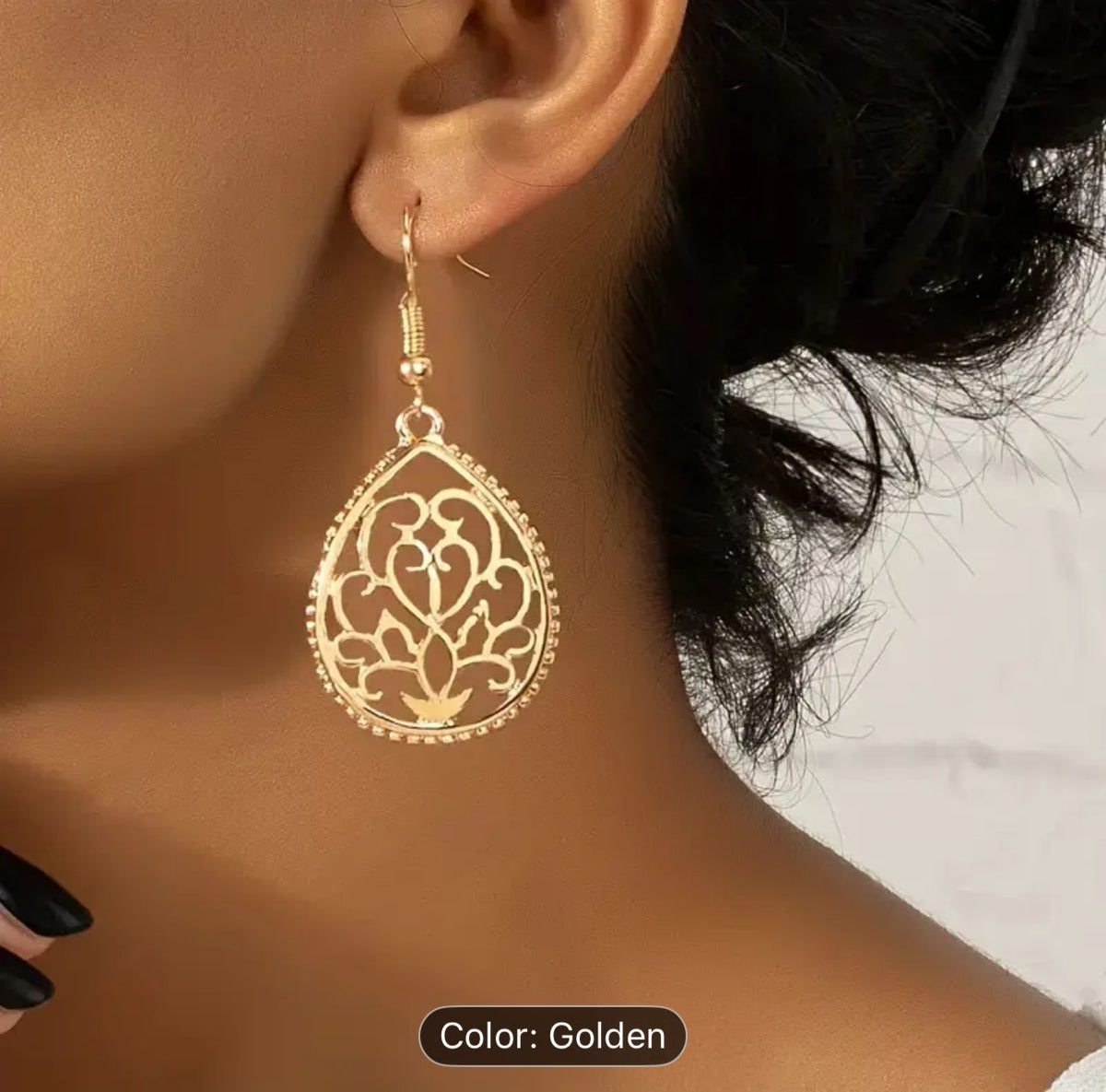Hollow Golden Flower Pattern Teardrop Dangle Earrings in Germany