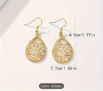 Hollow Golden Flower Pattern Teardrop Dangle Earrings in Germany