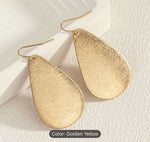 Golden Brushed Metal Teardrop-Shaped Earrings in Germany Namma Markt