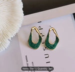 Twisted Oval Hoop Earrings in Germany