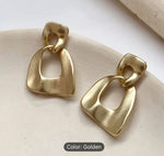 Modern Geometric Drop Earrings in Berlin