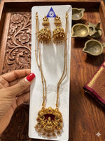 Gold-plated Goddess Lakshmi pendant and matching peacock jhumka earrings in Germany