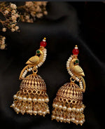 Peacock Shaped Jhumka Earrings with Pearl Drops in Germany