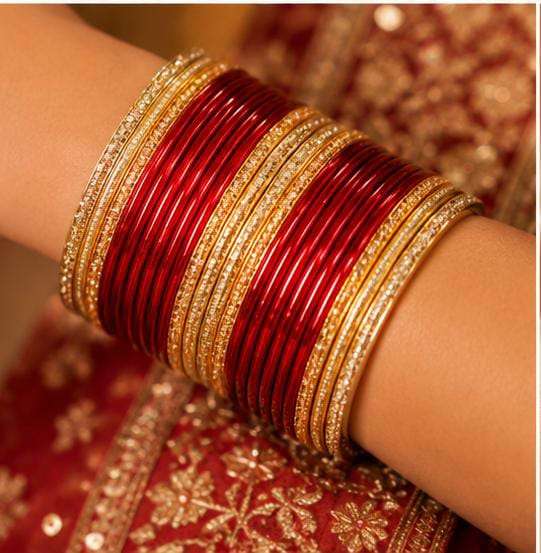 Red and gold traditional bangle set in Germany