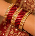 Red and gold traditional bangle set in Germany