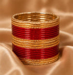 Red and gold traditional bangle set in Germany