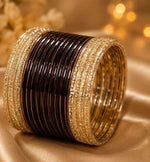 Brown and gold traditional bangle set in Germany