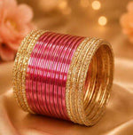 Pink and gold traditional bangle set in Germany