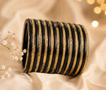 Traditional Black and Gold Bangle Stack in Berlin