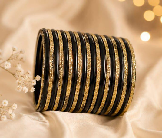 Traditional Black and Gold Bangle Stack in Berlin