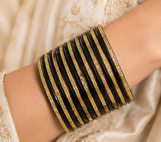 Traditional Black and Gold Bangle Stack in Berlin