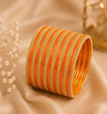 Traditional Orange and Gold Bangle Stack in Berlin