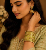 Lime green Kashmiri Ghungroo Metal Bangle Set in Germany