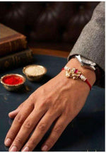 Traditional Designer Kundan and Pearl Rakhi on Wrist for Raksha Bandhan in Germany Namma Markt
