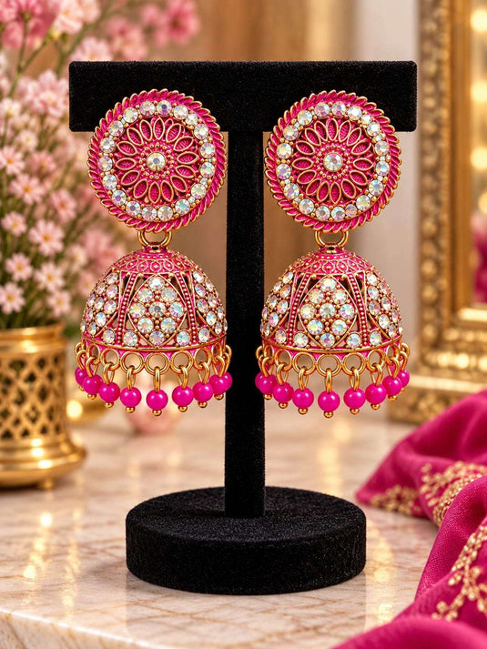 Traditional Antique Gold-Plated Jhumka Earrings with Iridescent Crystals and Pink Bead Drops in Germany