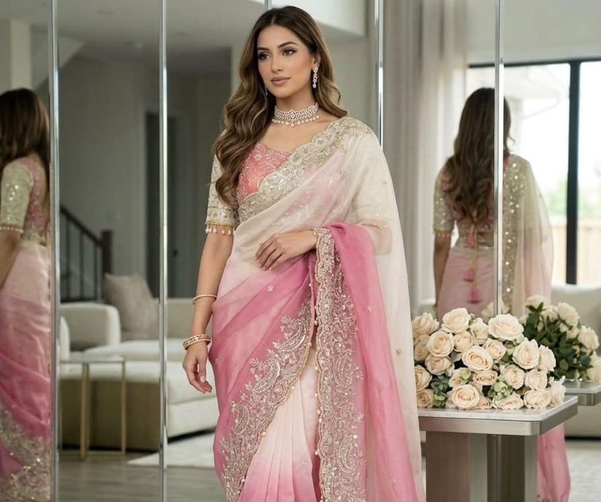 Pink and cream ombre designer saree paired with an intricately embroidered Stitched blouse in Germany