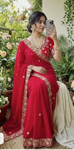 Red Embroidered Chiffon Saree with Scalloped Zari Border stitched Blouse in Germany