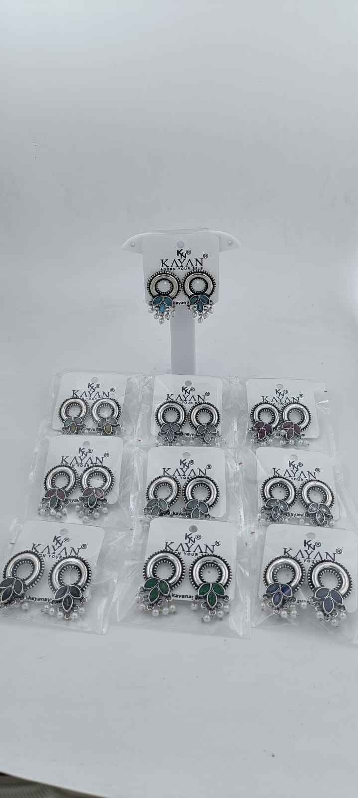 Designer Round silver Earrings in Paris