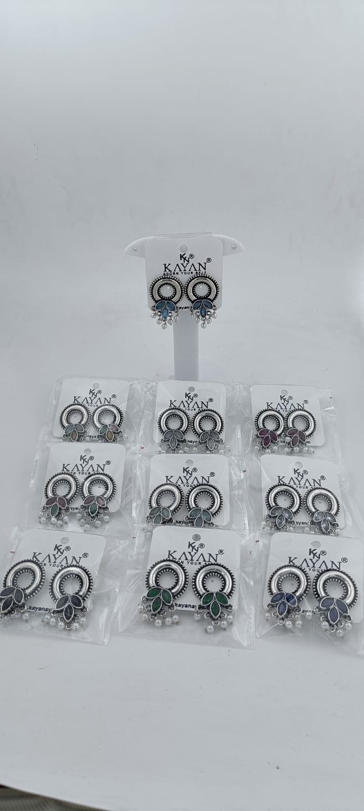 Designer Round silver Earrings in Paris