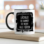 Bedruckte Tasse mit Spruch - "Lächle! Du kannst sie nicht alle töten"