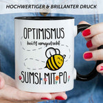 Bedruckte Tasse mit Spruch - Optimismus heißt umgedreht Sumsi mit Po