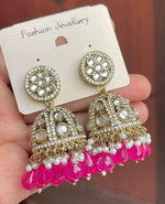 Gold-Plated Dome Shaped Kundan Studded Jhumkas