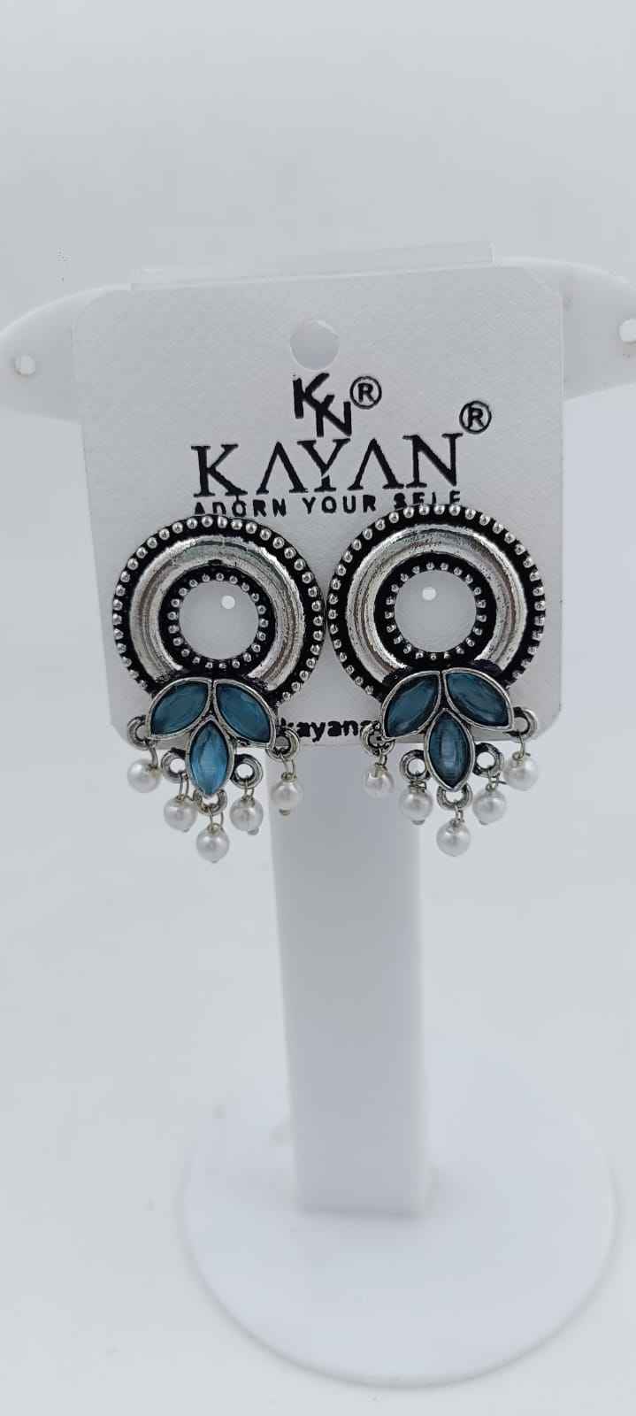 Designer Round silver Earrings  in Paris