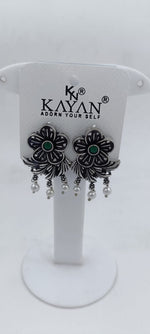 Black metal Flowers Earrings in Berlin