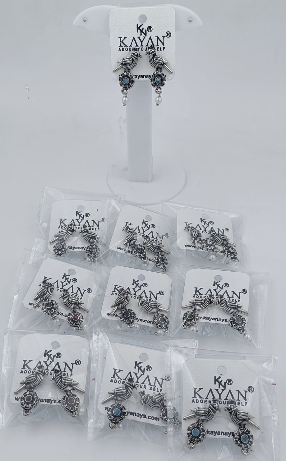 SILVER TONED HANDCRAFTED BIRD BRASS EARRING IN MUNICH