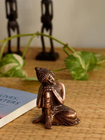 Resting Buddha on Knee Metal in Germany