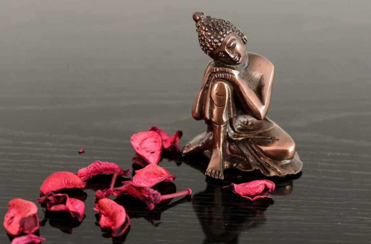 Resting Buddha on Knee Metal in Germany