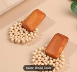WOOD AND RATTAN SEED EARRINGS IN GERMANY