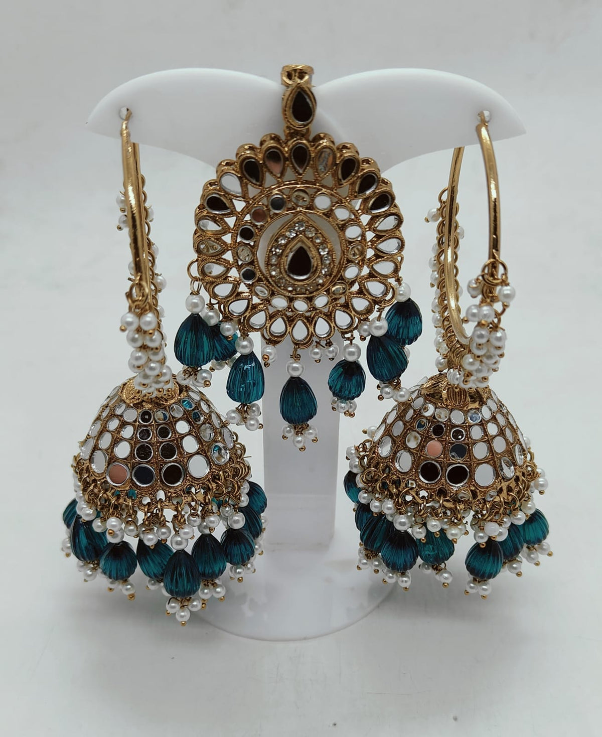 FASHION PARTY WEAR EARRINGS AND MANGTIKKA IN GERMANY