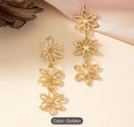 Golden Hollow Flower Design Long Dangle Earrings in Berlin Namma Markt