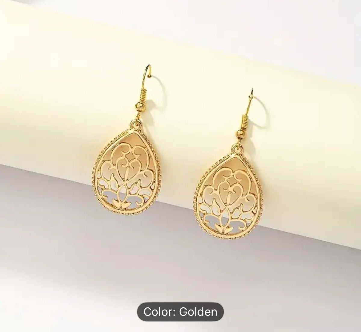 Hollow Golden Flower Pattern Teardrop Dangle Earrings in Germany