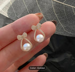 FASHIONABLE WESTERN STYLISH PRINCESS WHITE PEARL STUD EARRINGS IN BERLIN