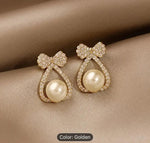 FASHIONABLE WESTERN STYLISH PRINCESS WHITE PEARL STUD EARRINGS IN BERLIN